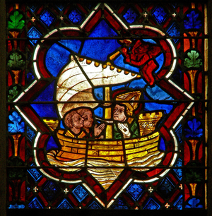 Scene in the E window depicting St Samson crosses the English Channel (stained glass)