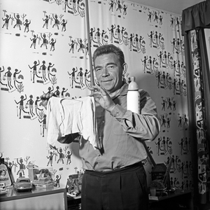 Peter Frankenfeld at his bar in the cellar of his house at Wedel near Hamburg, Germany 1950s