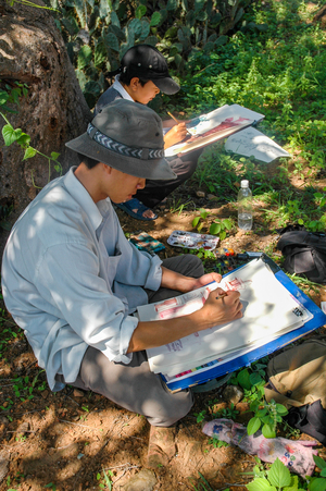 Cham culture: Artists painting the Po Re Me Tower, near Phan Rang, Vietnam.