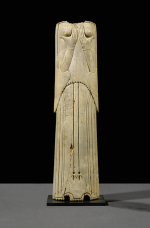 Woman holding her breasts …