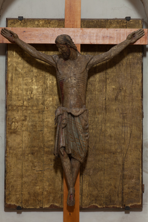 Collegiate church. Interior. Sculpture. Christ on the cross. Romanesque/gothic. Polychrome wood. 14th century.