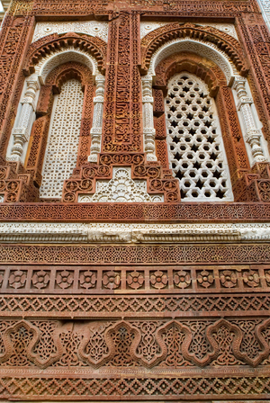 Profuse stone carvings on Alai-Darwaza, one of the most treasured gems of islamic architecture,  first building employing wholly Islamic principles of construction & geometric ornamentation, Qutb Minar complex, Unesco World Heritage Site
Delhi, India