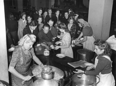 Food distribution to bomb victims, 1942 (b/w photo)
