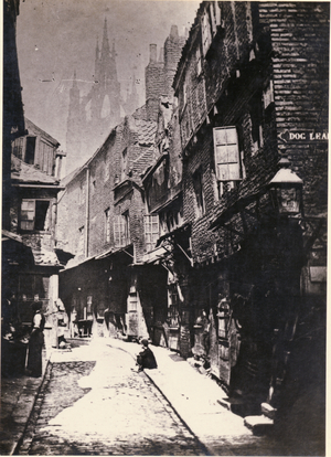 View of Castle Garth, looking towards St Nicholas Cathedral from the corner of Dog Leap stairs, Newcastle, UK, 1881 (b/w photo)