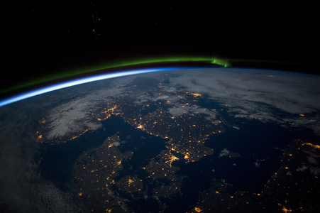 Southern Scandinavia under a full moon, showing the Northern lights aurora, 2015