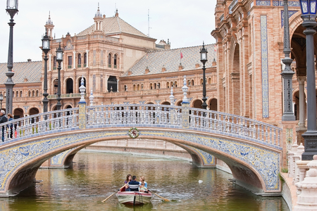Rowboat Under Bridge on Canal, Plaza De Espana, Maria Luisa Park, Seville, Andalucia, Spain, Europe (photo)
