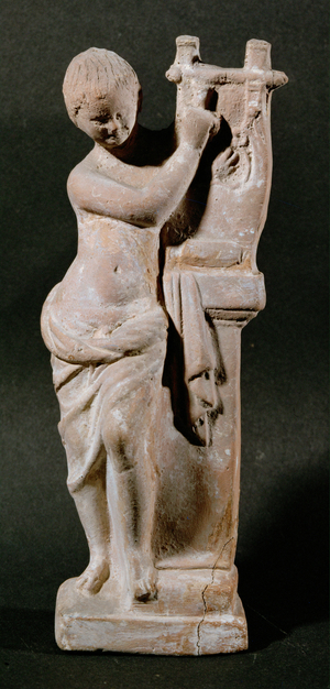 A child playing the cythara. Terracotta ...