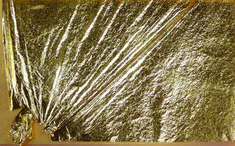 Gold foil used in jewellery and glass decoration.