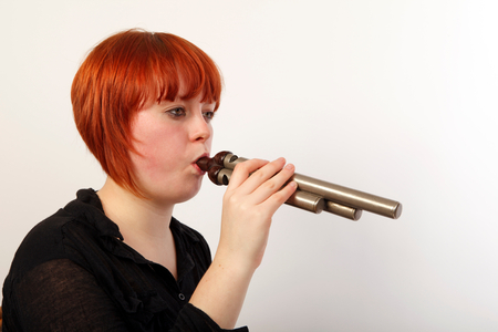 Percussionist playing a large Train whistle