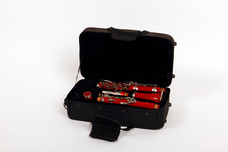 Red B flat clarinet in a case