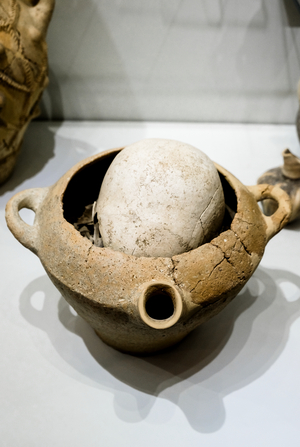 Burial of a skull in pottery, 2100 - 1800 BC (bone, pottery)
