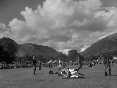 Two wrestlers in hold at Grasmere Sports, 1930s-60s (b/w photo)