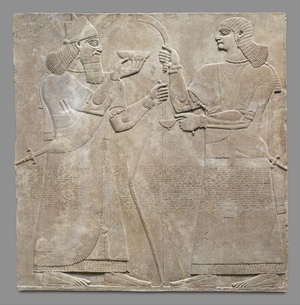 Relief panel of king and eunuch, c.883-59 B.C. (gypsum alabaster)
