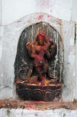 Hinduism/Small shrine to Hindu goddess Saraswati in wall of Tibetan Buddhist Boudhanath Stupa, Kathmandu, Nepal (photo)