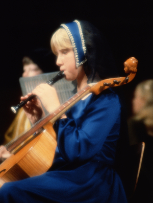 Girl playing descant recorder