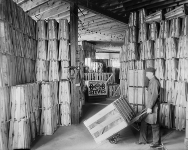 Worker in Shipping room, Glazier Stove Company, Chelsea, Michigan, USA, c.1905 (b/w photo)
