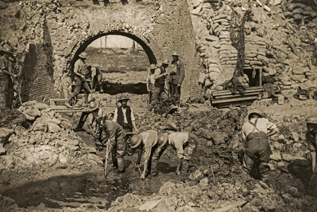 British soldiers draining captured ground, Flanders, 1914-18 (b/w photo)