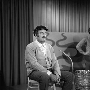 German cabaret artist and comedian Juergen von Manger in his programme on stage in December 1969