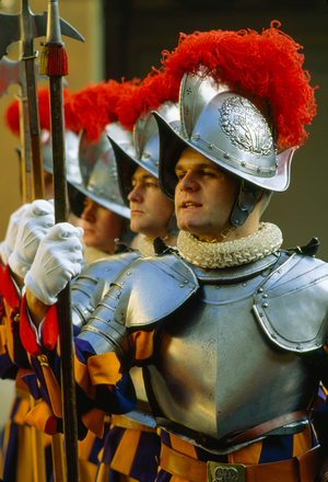Swiss Guards, st,ing at attention, wear ancient garb of armor and plume at the ann..., 1980s (photo)
