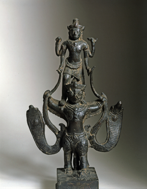 THAI ART: Narai standing on Garuda holding Naga. Lopburi Style., 12th-14th century (bronze)