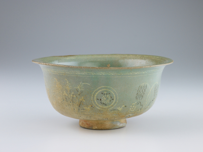 Bowl, 14th century (stoneware with white and black inlays under celadon glaze)