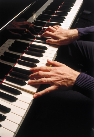 Piano keyboard being