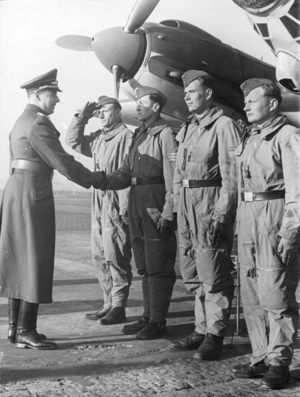 Colonel Rudolf Fuchs greets German bomber pilots, 1940 (b/w photo)