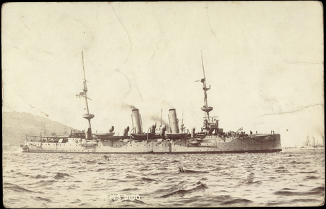 Warship H. M. S. Dido near the coast