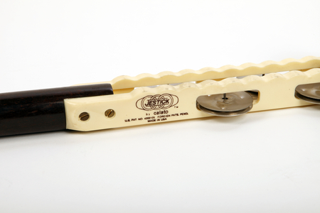 Jestick. Mixture of a clave, guiro effect and jingle stick. Made by Calato. (photo)