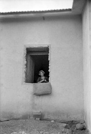 CROTONE COUNTRYSIDE - WOMAN AT THE UNFINISHED WINDOW, 1954 (photo)