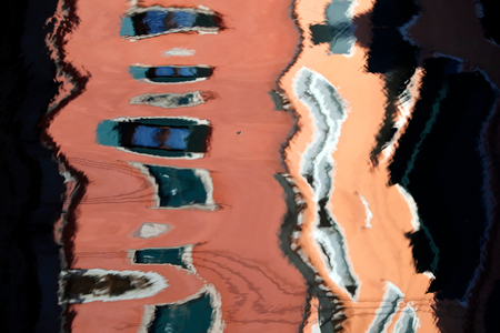 A canal reflection of Venetian houses, Venice, Italy (photo)