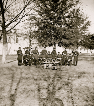 Band group seated behind their instruments 1863 (photo)