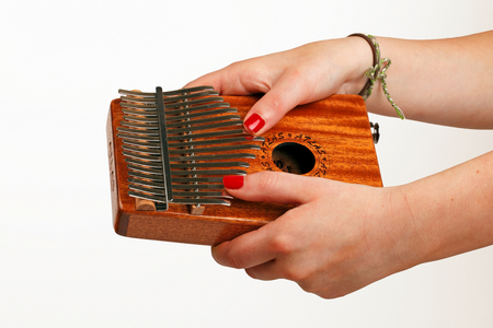 17 note Kalimba in the key of C, Thumb piano, sound box, resonator, Made by Atlas, complete with an electronic jack socket and pick up, Being played