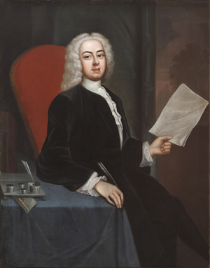 An Unknown Young Man holding a piece of Paper