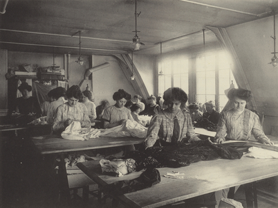 Dressmakers' workshop in an attic (b/w photo)