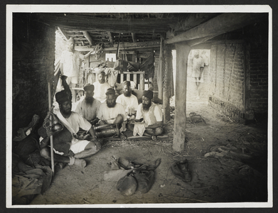 Sikhs singing religious chants in a French barn, 24th July 1915 (b/w photo)