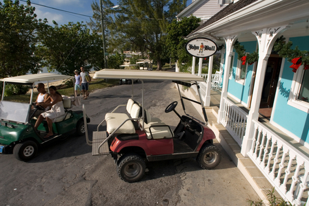 Golf car and loyalist home, Bahamas (photo)