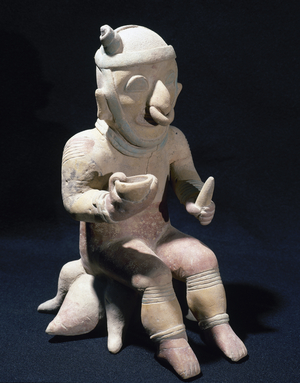 Pre-Incan. Jama-Coaque Culture. 500 BC-1531 AD. From Ecuador. Sitting male figurine.