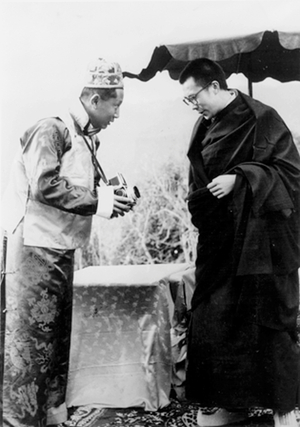 Dali Lama being photographed by mararajkumar of sikkhim ( son of maharajah of sikkhim) April 08, 1959 in India