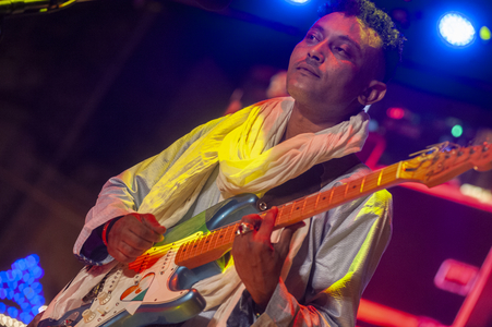 Bombino's band guitarist performing at Carpino Folk Festival, Puglia, Italy, 2017 (photo)
