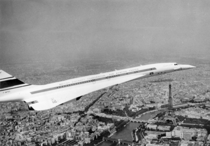 French Supersonic Plane "Concorde 001" Flighing Over The Eiffel Tower, 1969 (photo)