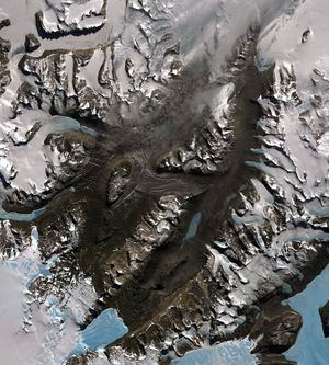 The McMurdo Dry Valleys are a row of valleys west of McMurdo Sound, Antarctica. They are so named because of their extremely low humidity and lack of snow and ice cover. December 8, 2002. Satellite image.