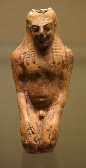Terracotta perfume vessels in the shape of a kneeling man
