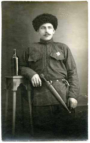Portrait of a Cossack Veteran of the Russian Civil War, 1923 (b/w photo)