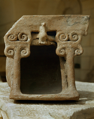 Small domestic shrine: model of a temple (clay)