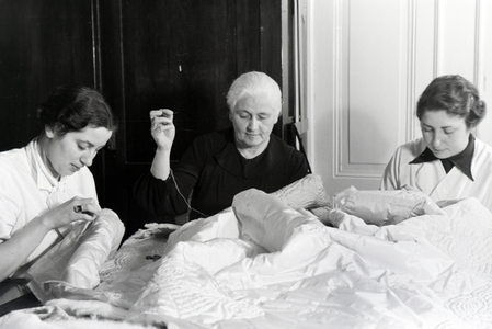 Women embroidering textiles, Germany 1930s (b/w photo)