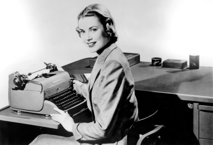 Grace Kelly with Remington typewriter, c. 1950 (photo)
