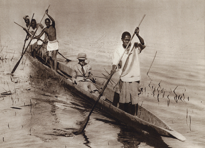 The Prince of Wales in a dugout boat on the Zambezi River (b/w photo)
