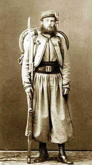 Italy: Vatican Zouave of Major O'Reilley's Papal Brigade, and a veteran of the battles against Garibaldi. Fully armed and equipped with a .71 cal. Model 1842 French Rifle with sword bayonet, and backpack.