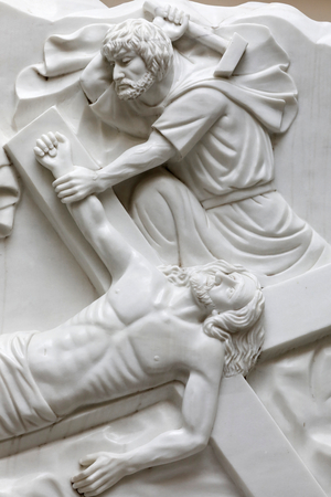 Jesus is nailed to the cross.  Vietnam.(relief)